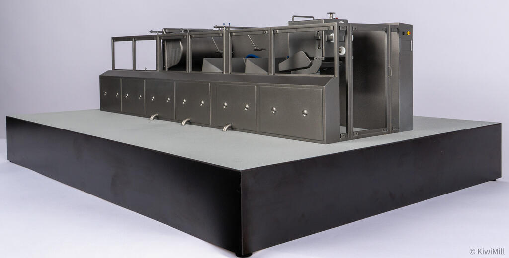 Cooking line model from a low side angle with guard grates removed, showing open frames and the end cabinet
